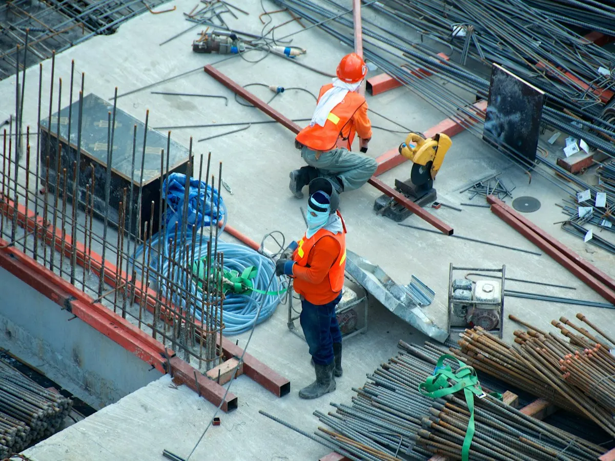 Installer working on an aluminium frame on site